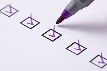 Generic checklist with purple tickets in boxes